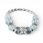 wearing-green-rutile-bracelet-with-bamboo-butterfly-charms