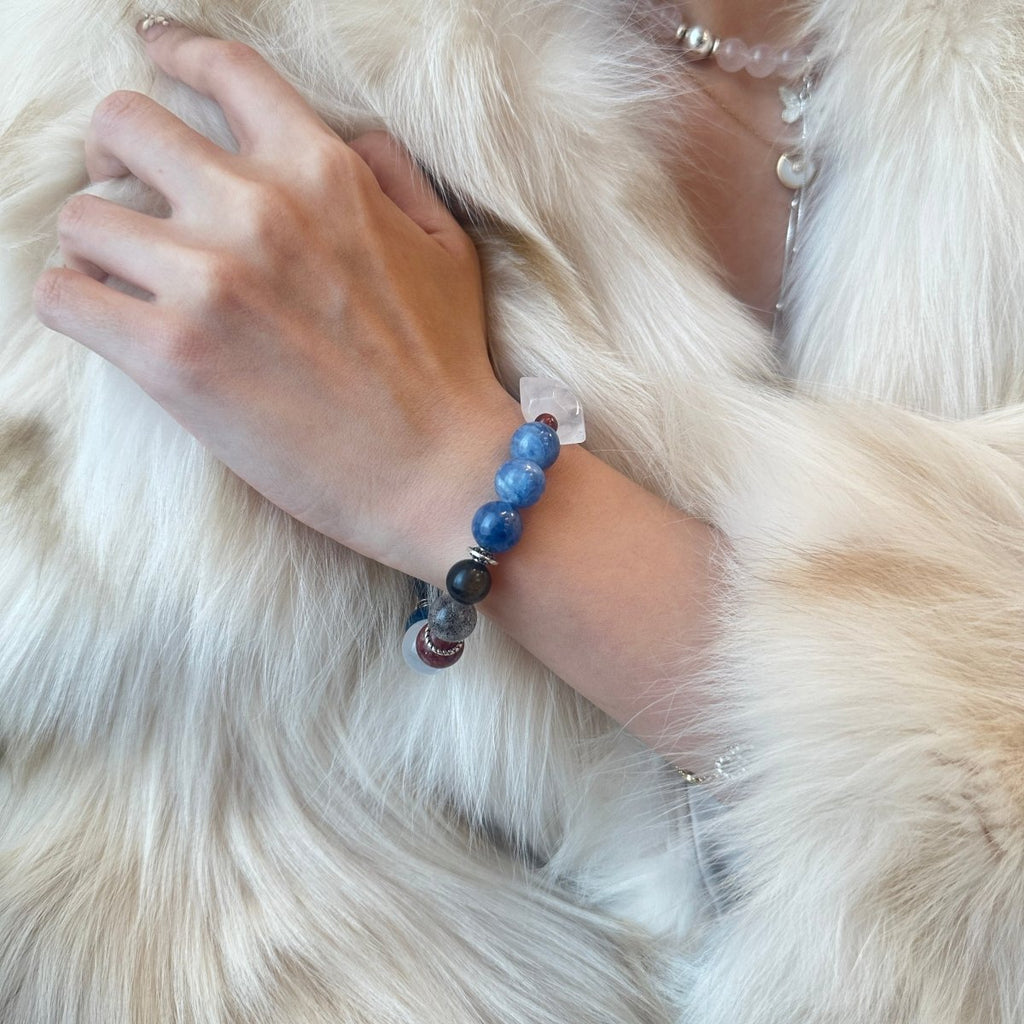 wearing-large-bead-multi-gemstone-bracelet-for-energy-alignment