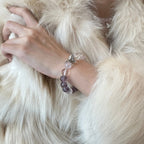 wearing-amethyst-rose-quartz-bracelet-for-emotional-healing