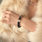 wearing-obsidian-smoky-quartz-bracelet-for-grounding