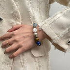 wearing-multi-gem-chakra-bracelet-for-cosmic-energy