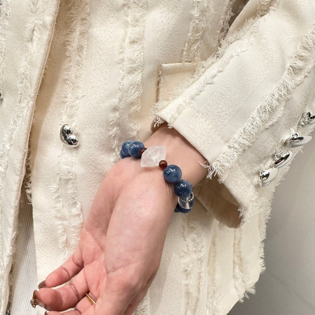 wearing-large-bead-multi-gemstone-bracelet-for-energy-alignment