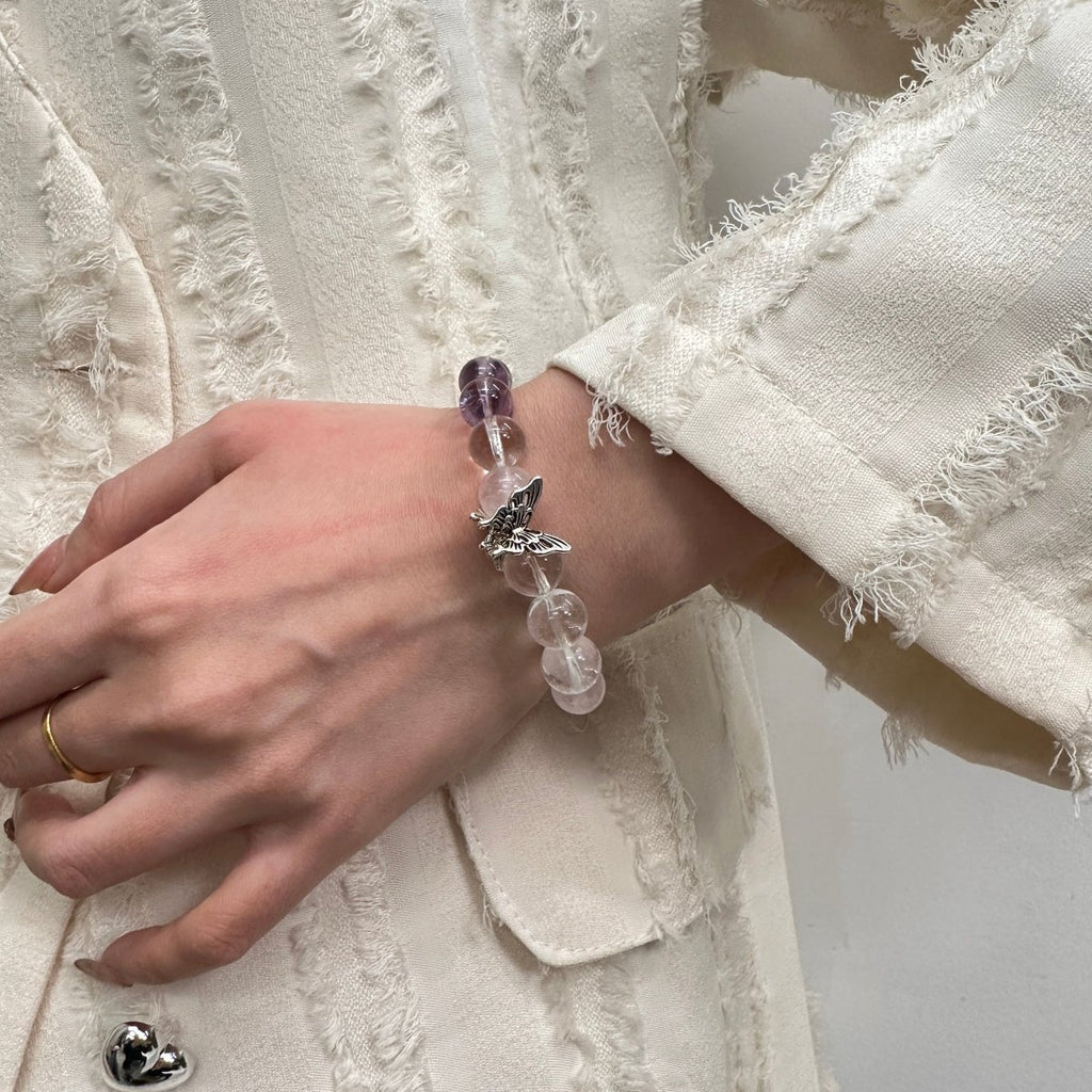 wearing-amethyst-rose-quartz-bracelet-for-emotional-healing
